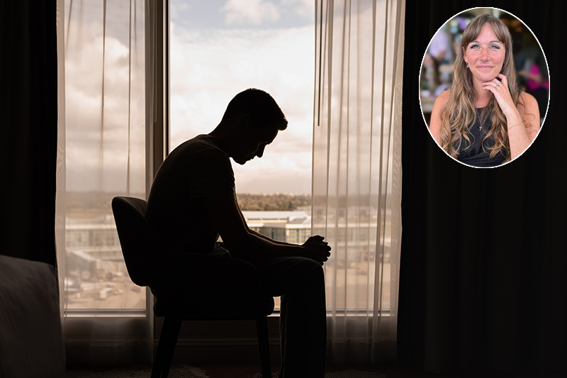 thoughtful man in a dark room with head down, Dr Louise sharp inset
