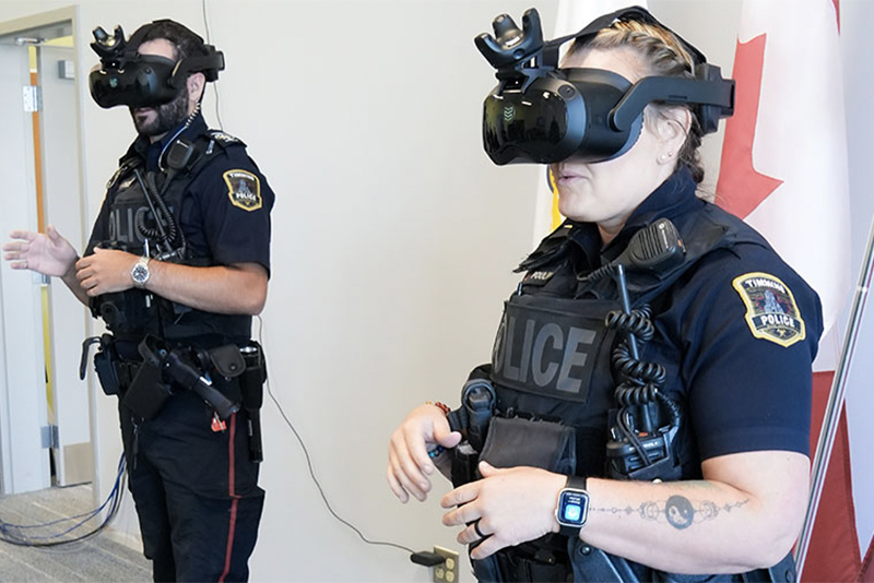 Officers from the Timmins Police Service participate in Laurier's Mental Health Crisis Response Education and Applied Training Program using virtual reality headsets