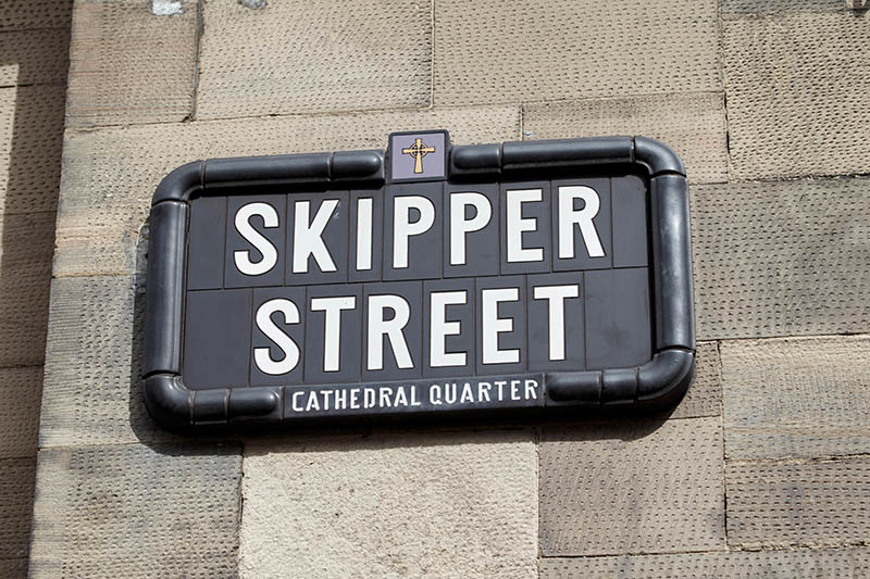 cathedral quarter nameplate for skipper street one of the cities oldest streets