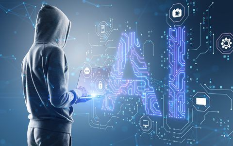 Side view of hacker in hoodie using laptop with glowing blue AI hologram on blurry background.
