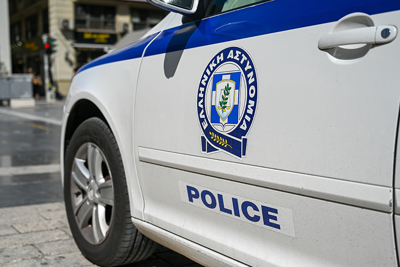 Hellenic Police patrol car in Greece, showing police badge