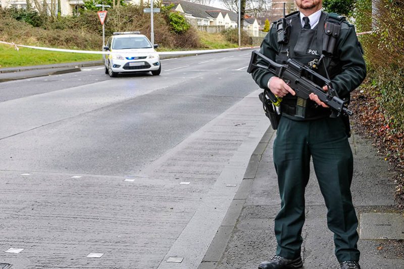 A Police Service of Northern Ireland (PSNI) police officer armed with an Heckler and Koch G36C assault rifle