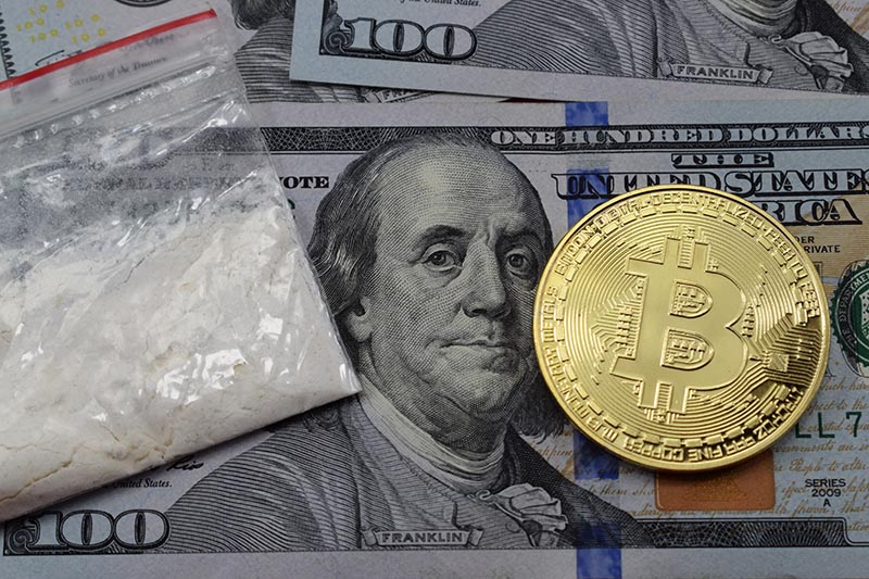 image showing the sale and laundering of dirty money (dollars) earned on drugs through bitcoin