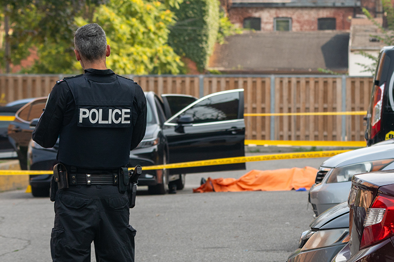 Toronto police investigate a fatal shooting in a parking lot in the city's downtown east end.
