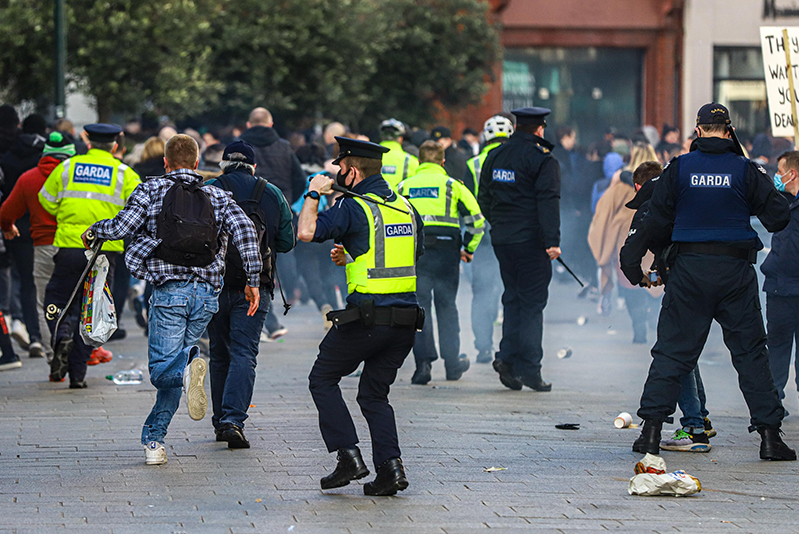 Gardai clash with protesters at an anti-lockdown gathering in Dublin