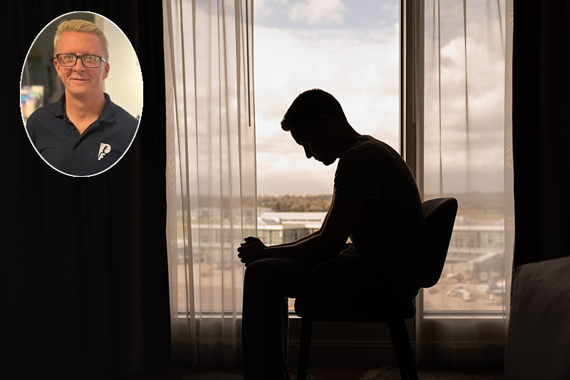 thoughtful man in a dark room with head down, Portrait of thoughtful sad man alone. prayer, Fear, sadness, abuse, depression, addiction.