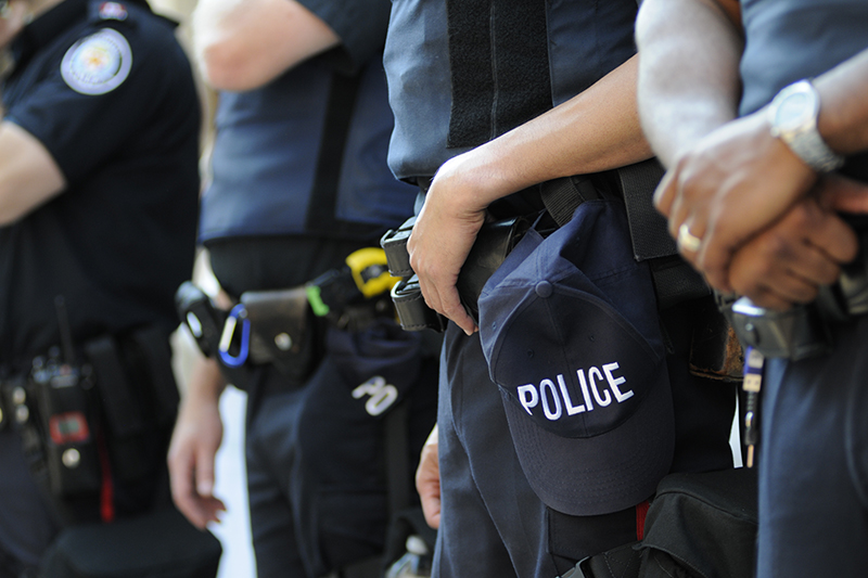 Close up of Toronto police officers (unidentified)with all weapons and armours
