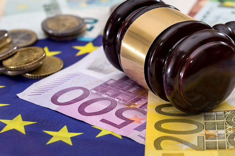 financial judgment with judge's gavel different Euro banknotes. European Union money. Law concept