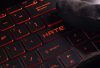 The image features a dark keyboard with red lighting, prominently displaying the word "HATE." It evokes themes of online threats and cybercrime relevant to policing insights.