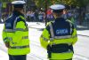 Two Garda officers on patrol in Dublin, viewed from behind